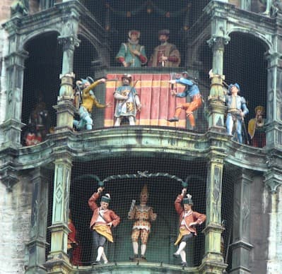 The medieval figurines of the Glockenspiel on the Rathaus in the Marienplatz that dance around each hour as the clock chimes. This is a big tourist draw each hour.