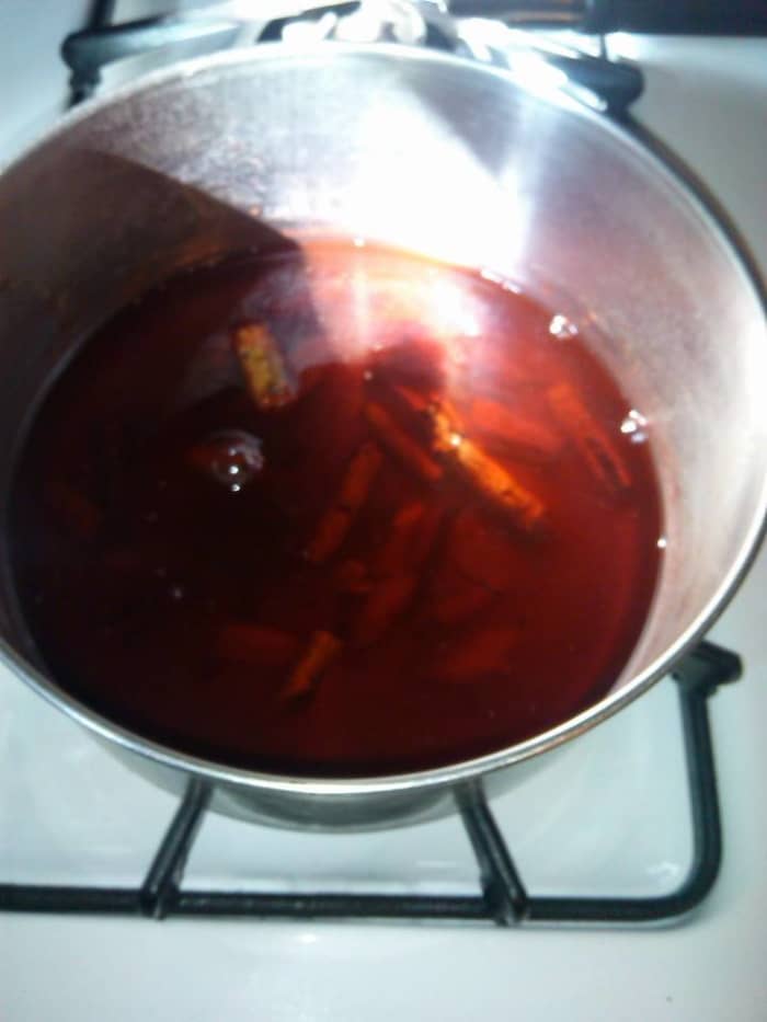 First fill your pot with cool water and sassafras root, then put it on the stove. This varies slightly from most tea making procedures. You need the root in prior to boiling the water to get all the safrole from the root.
