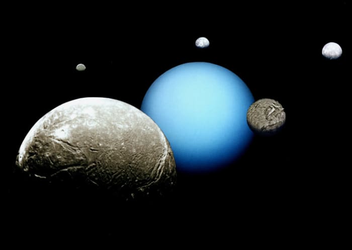 This image shows Uranus with its largest moons Ariel, Miranda, Titania, Oberon and Umbriel.