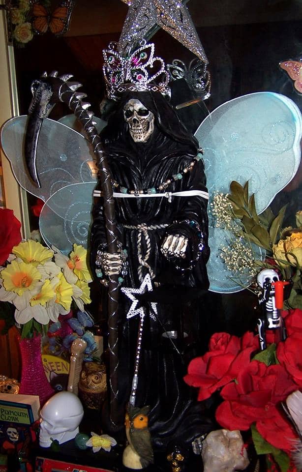 I'm sure La Negra was fairly miserable, but she was sweet enough to let me dress her up pretty since they do it in shrines in Mexico.
