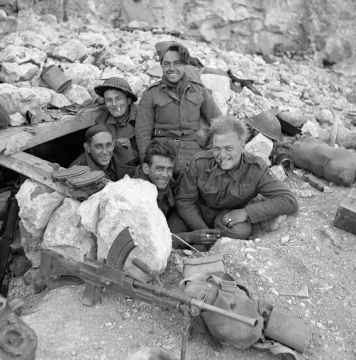 Men of the Royal West Kents hold a dugout on Monastery Hill - their regimental comrades in N E India (overlooking Burma) had it far worse