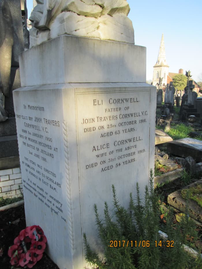 John's mother and father are commemorated to his left facing observers, mother Alice at the age of 54, his father Eli at 63