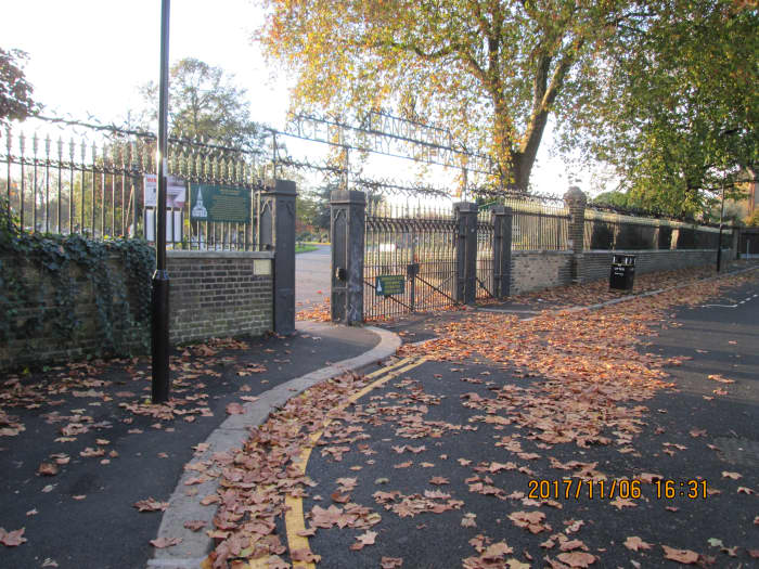 Seen from Whitta Road going east to the railway station, the iron railings and gates are well maintained, closing times posted on a board inside the cemetery