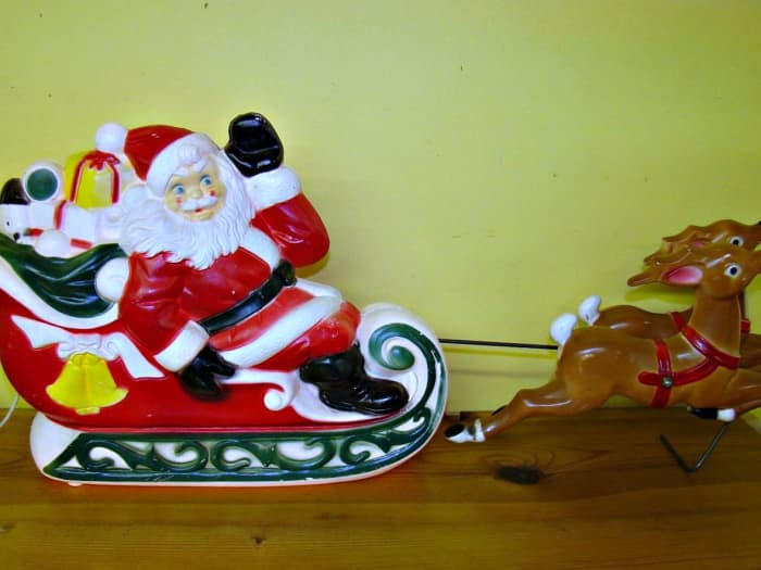 Amazing 1970 Empire Blow mold Santa Claus with his Sleigh and Reindeer in nice Sleigh and the attached reindeer are a combined 25" inches in length and sleigh is 11" inches tall.