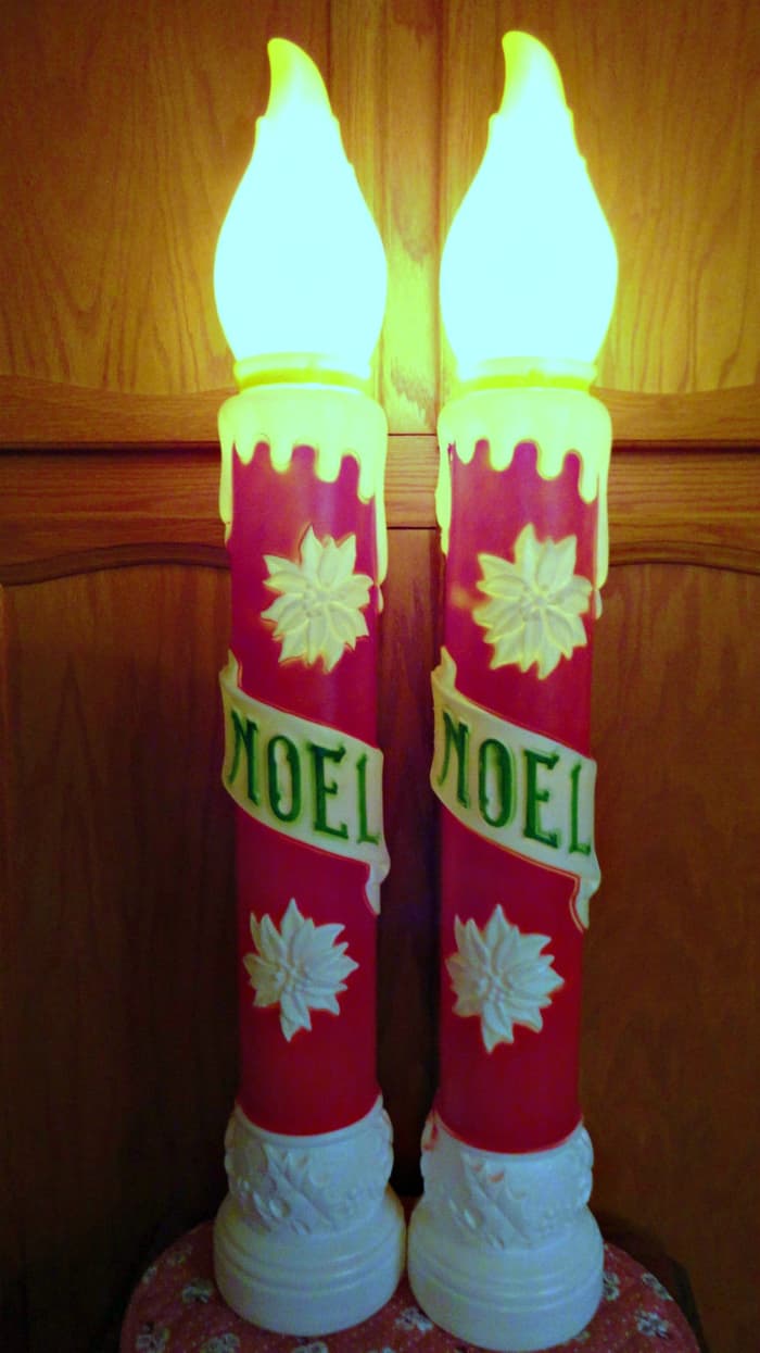 Thirty nine inch tall Empire Noel Christmas Candles, Blow Mold light up year decoration with holly poinsettia decorative design. Empire Tarboro, N.C. Made in U.S.A. Carolina Enterprises Inc. 1973.