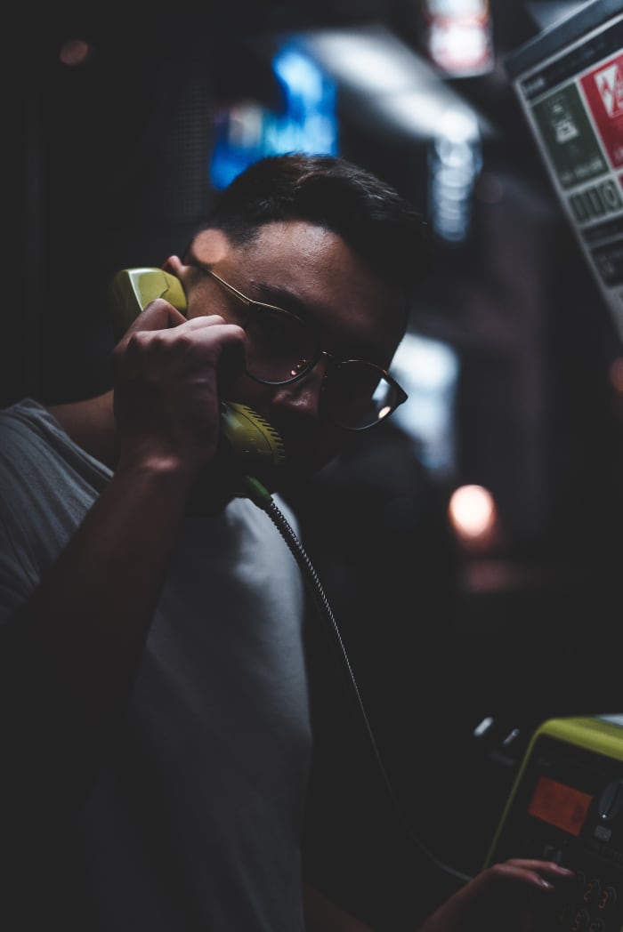 If you feel unsafe calling the police from your own phone, you can try to stay anonymous by using someone else's.