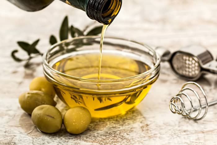 Olive oil moisturizes hair and eliminates split ends. Incorporate it in your hair routine and witness its magic.