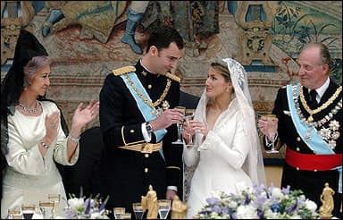 Spanish Crown Prince Felipe of Bourbon and his wife Princess of Asturias Letizia Ortiz toast next to Juan Carlos of Spain and Queen Sofia during the wedding reception at the Royal Palace in Madrid.