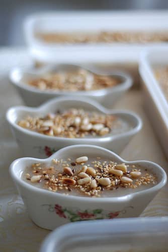 Noah's pudding in bowls prepared for the Asure Gunu or Asure Day feast. (Photo by Hayat-i Ebediye@flicker)
