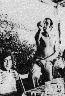 The obscene version of the thumb up gesture, used in southern Sardinia.