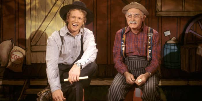Mike Snider with Grandpa Jones, who would introduce the finger-picker to the clawhammer style of playing banjo, on the set of Hee Haw.