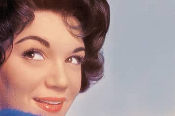 Connie Francis recorded the song in Italian, Neapolitan ( Portami Con te) and in Spanish ( Llevame la luna)