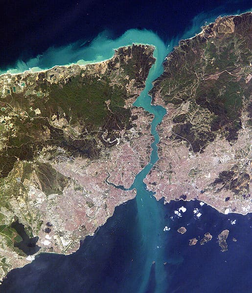 Arial shot of Istanbul, Turkey with the Bosphorus waterway running through the city. The left is Europe and the right is Asia.