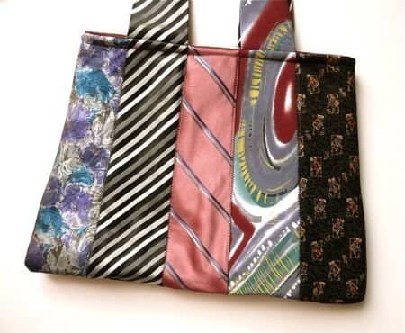 #1 - The ties from the body of this Handbag extend up to become the handles of the purse giving it nice flow. This is a great design from CraftyPod!