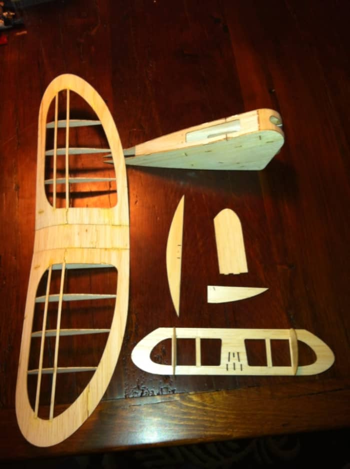 After all the pieces are glued together, spray them with a no-gloss/satin polyurethane spray. The Balsa sucks it up quickly!