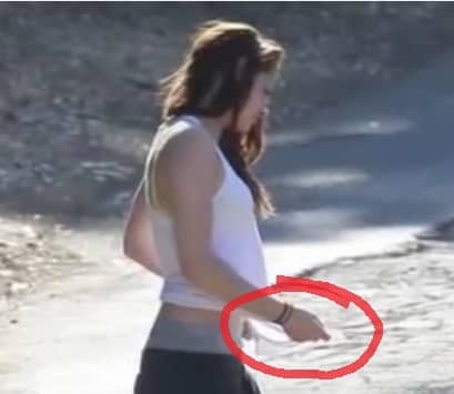 The only photo that's been found of Kristen Stewart carrying papers. Thanks Twilight Fan for catching this (in the comments, below). This image was captured from the video that you will soon come to.