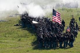 A Living History begins to Fire By File - you can see the musket discharge from the far right File of the Company that is closest to the camera