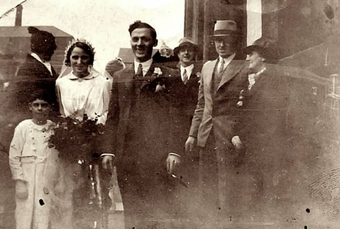 Mum's brother, Ken Trigg, is the young boy on the left, at a family wedding in the 1930s. It was the wedding of my grandad Frank Trigg's younger brother, Charlie, to Kitty. My great grandma (grandad's mum) is on the right.