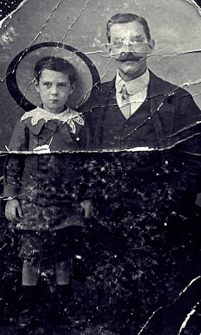 Grandad as a young boy in around 1910, pictured with his father, in a photograph staged at a studio. They are wearing their "Sunday best", as a photo like this was a rare occurrence.