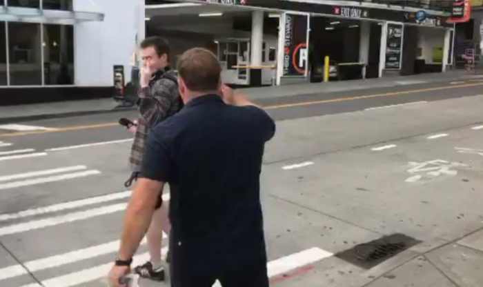 Jones stalked this guy on the streets of Seattle, then turned to chase down this next dude. Dude and his coffee didn't take it so kindly.