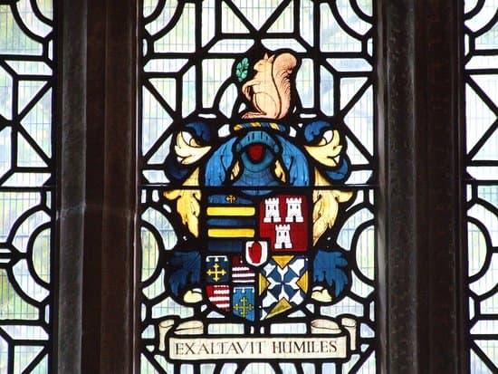 The Holte Family Crest, complete with Red Hand. The motto means "Lifting up the Lowly", as opposed to murdering them.