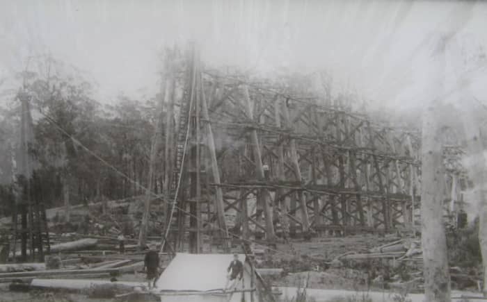 An early photo showing the precarious position of the workers when building the Stony Creek Trestle Bridge