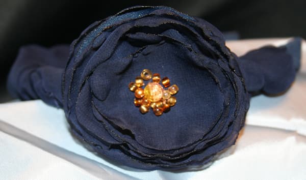 This one took the most time to make, since I covered the headband with two different navy blue materials.