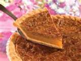 Mashed potato pie with pecans could tempt and trick just about anyone with an appetite. I like icy whipped topping with coconut on it.
