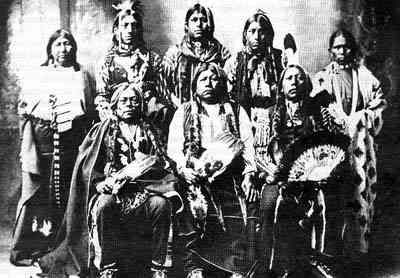 1898 Tonkawa Indians-Photo credit: http://commons.wikimedia.org/wiki/File:Tonkawa_chiefs.jpg Tonkawas photographed by Rhinehart in 1898. Standing L-R, Winnie Richards, John Rush Buffalo, William Stevens, John Allen, and Mary Richards. Seated L-R Joh