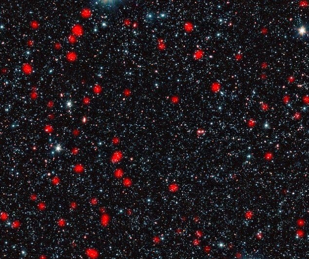 This image shows these distant galaxies, found in a region of sky known as the Extended Chandra Deep Field South, in the constellation of Fornax. The galaxies are so distant that their light has taken around ten billion years to reach us, so we see t