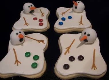 Melting snowman cookies. Sugar cookie dough, M&M for buttons.