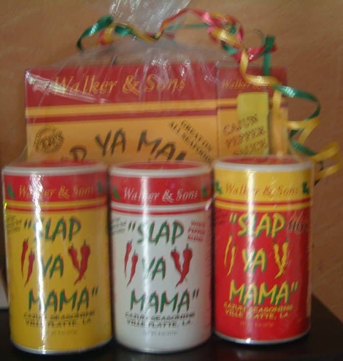A gift pack of Slap Ya Mama Cajun fish Fry, Cajun Pepper Sauce, Cajun Seasoning, White Pepper Blend and Hot