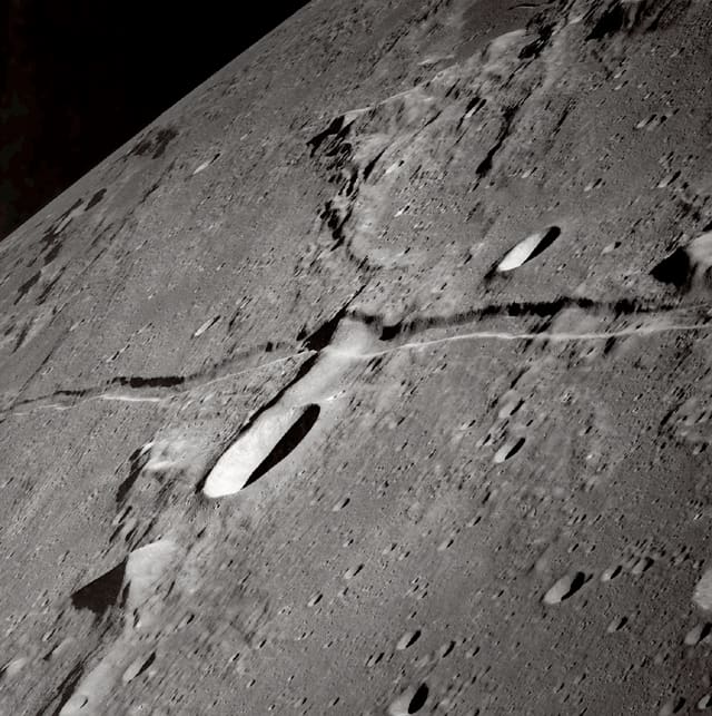 This is the cleft left behind after the Prophet Muhammad (pbuh) split the moon over 1400 years ago! Please copy and paste this link to see for yourself: http://apod.nasa.gov/apod/ap021029.html