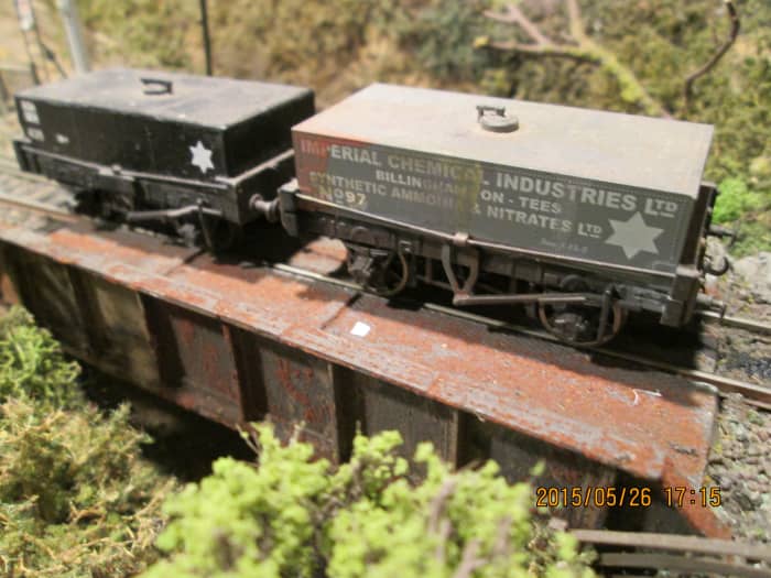 A pair of elderly tar wagons - this traffic would be largely road-borne before British Railways reached its fifth birthday (1953). The black one is a Slater's kit, the other is a Dapol product
