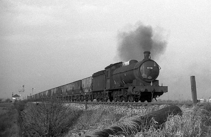 Tyneside Q6 0-8-0 63354 of Borough Gardens (54C) heads a mineral working near Boldon, County Durham - there were several pits in the area between Tees and Tyne, with coal going for export through Hartlepool and Tyne Dock