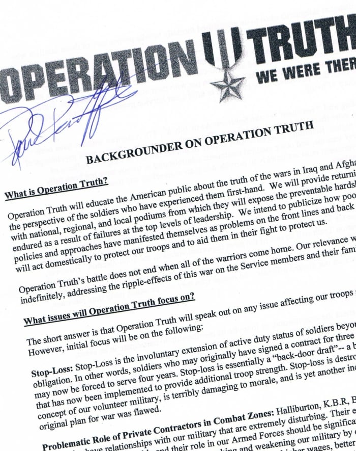 This flier, signed by IAVA.org founder and war veteran Paul Rieckhoff, was secured on August 14, 2004 at a Soldiers & Military Families Speak Out About War On Iraq program... a Mouths Wide Open Community Center event.