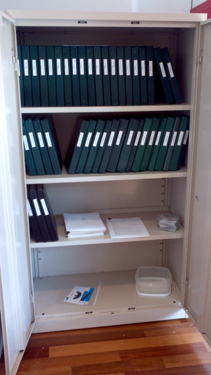 This is the opened shelving unit exposing my entire collection, kept in binders in the same chronological order I gathered everything, and opened when visitors wanted to check out certain dates.
