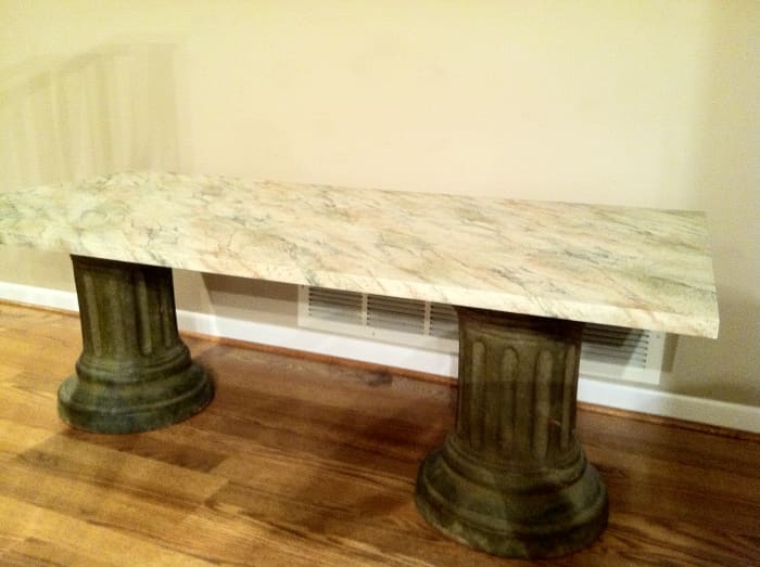The Finished Faux Stone Coffee Table Sitting on Two Bases