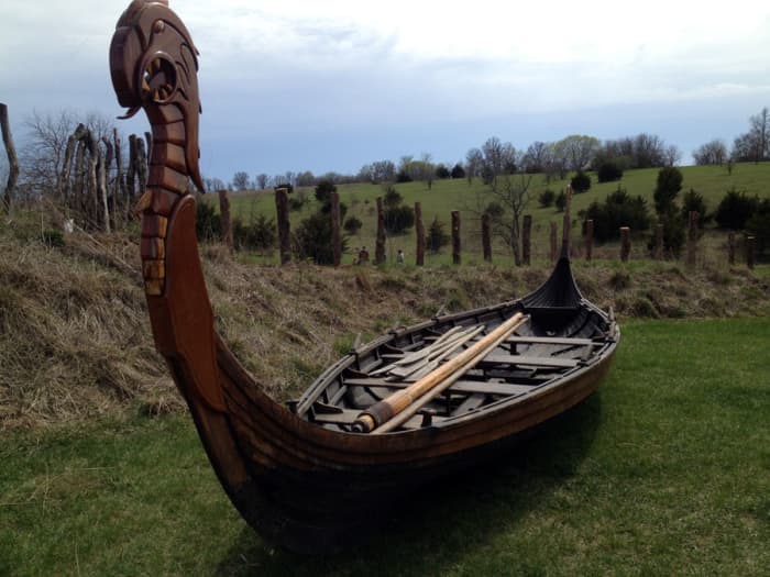 A 'karve' or launch with high dragon prow. A karve would usually be built for noblemen or kings to ferry them to their drakkar or warships, maybe to the next fjord on a social visit
