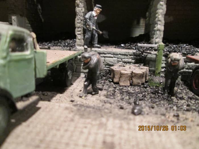 loading up the delivery lorries prior to weighing and departure. The 'Clean Air Act' of 1956 would gradually lead to smoke-free zones and coal deliveries would give way to 'cleaner' fuels like oil and gas for central heating.