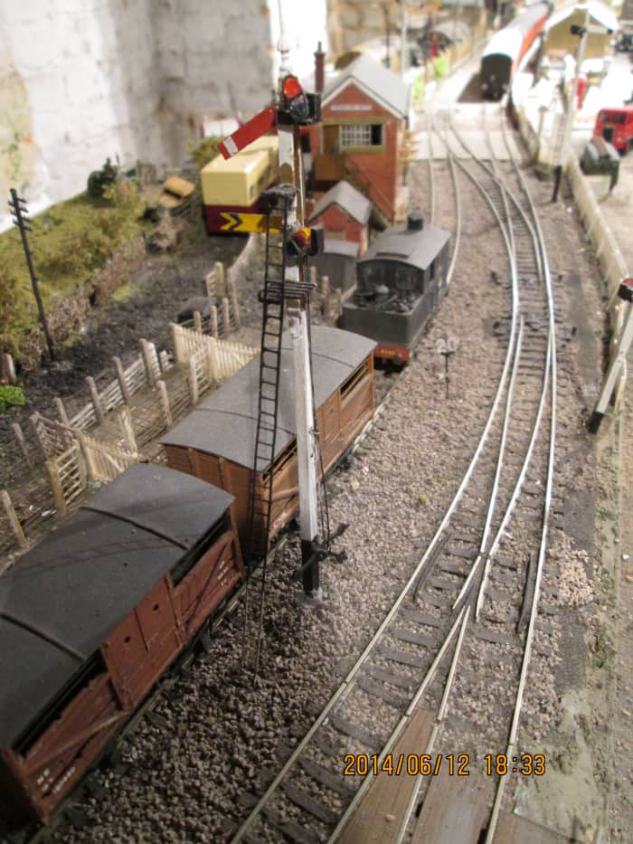 The path is set for the next 'up' working. Here we are looking past the 'up' home at 'off'', down at the livestock dock. Through running line centre, coal depot siding on the right