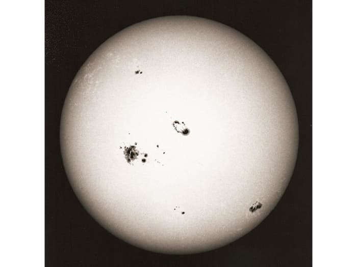 Sun with sunspots, analogphotography with a 4" Maksutov telescope and foil-filter ND 4; Date = 28 October 2003; Author = Hans Bernhard (Schnobby) http://creativecommons.org/licenses/by-sa/3.0/