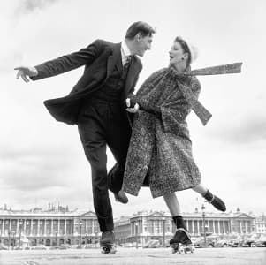 Avedon brought a fresh approach to fashion, such as this whimsical 1956 photo of models Suzy Parker and Robin Tattersall rollerskating in Paris.