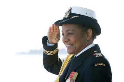 Governor General and Commander-in-Chief of the Canadian Forces Michalle Jean salutes on the HMCS Algonquin destroyer in Victoria, B.C. on Saturday during an international fleet review celebrating 100 years of the Navy in Canada, June 2010