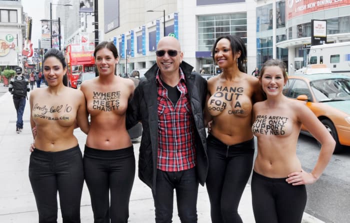 Howie Mandel while shopping downtown Toronto posed with the Rethink Breast Cancer ladies promoting BoobyBall 10