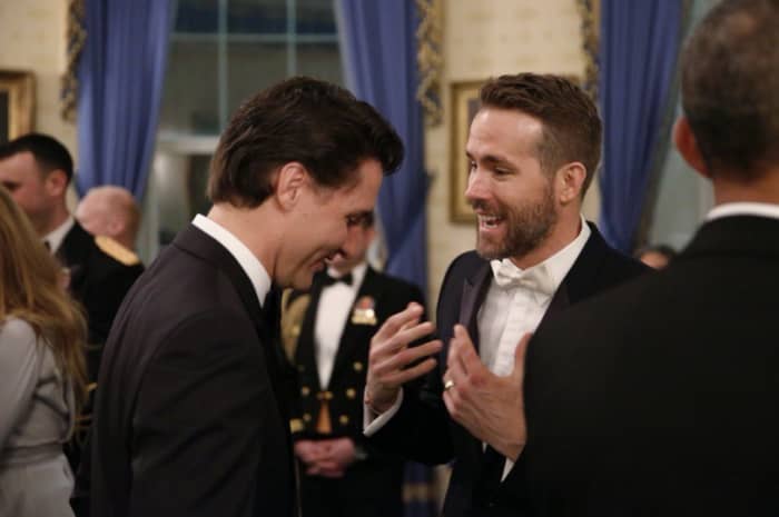 Ryan Reynolds speaks to Canadian Prime Minister Justin Trudeau during the state dinner at the White House