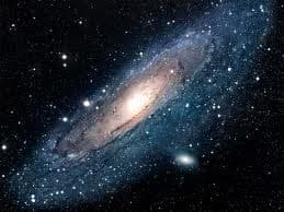 Our Milky Way Galaxy, one of the millions of galaxies in the universe; all heavenly bodies in the galaxies spin around themselves and orbit around other larger bodies.