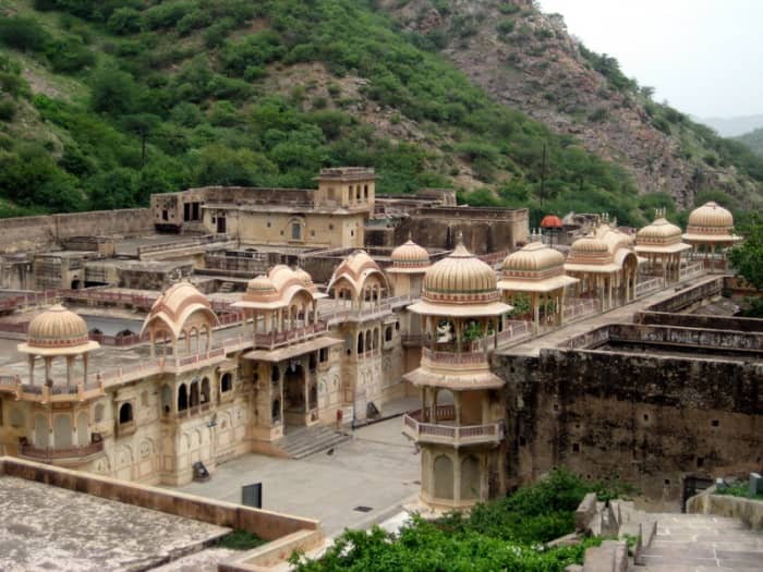 The Temple of Galtaji is a great place to swim, but its fame is due to the large tribe of monkeys that live here. It's so beautiful that it seems like something out of a movie!
