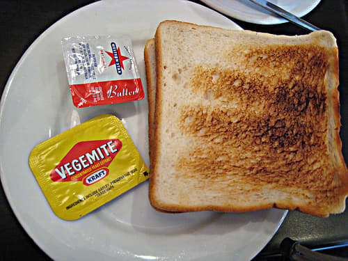 Little packets / sachets / plastic containers of Vegemite and the usual mini butter containers are a staple at pretty much all Australian hotels where a hot buffet breakfast or light continental breakfast is served.