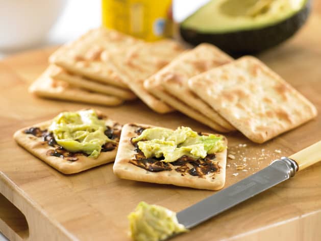 Here's another way to combine Vegemite and avocado - spread an avocado paste or thin slices of avocado on top of a thin layer of Vegemite on a cracker or crispbread.